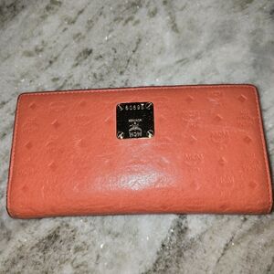 MCM Orange Embossed Leather.Authentic